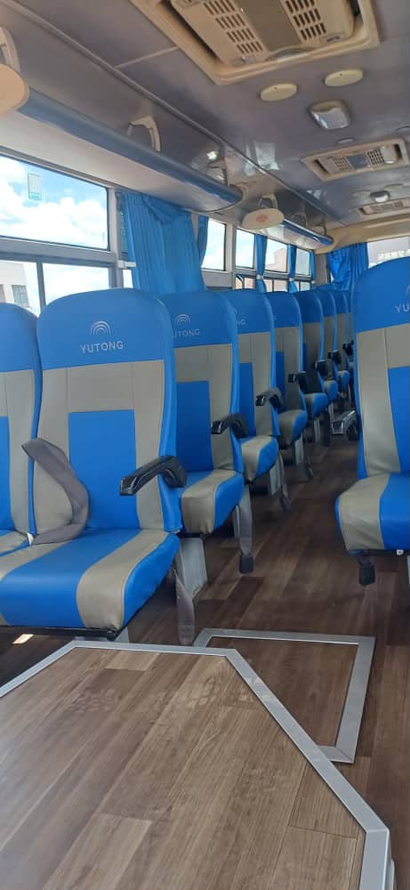 Comfortable blue seats inside an Averk coach