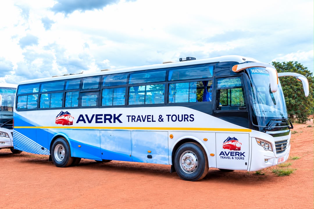 Averk luxury coach parked under a blue sky